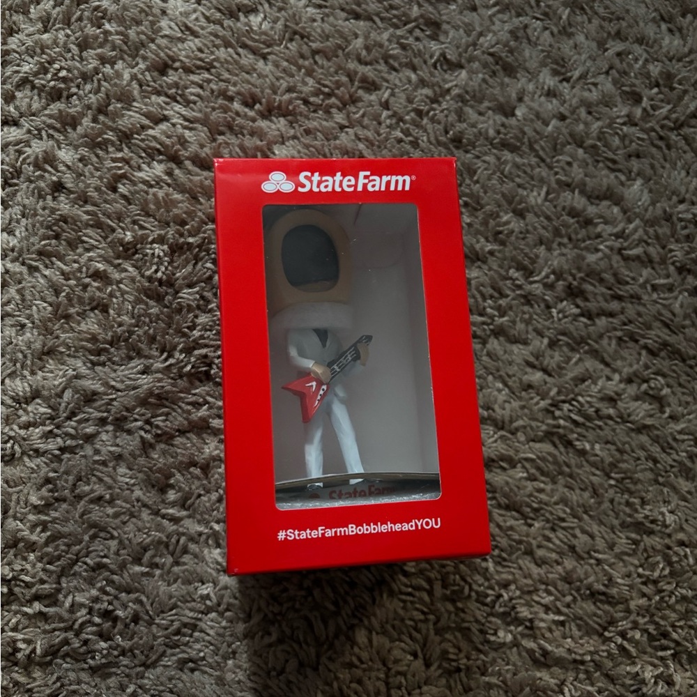 State Farm Bobblehead with Red Guitar
